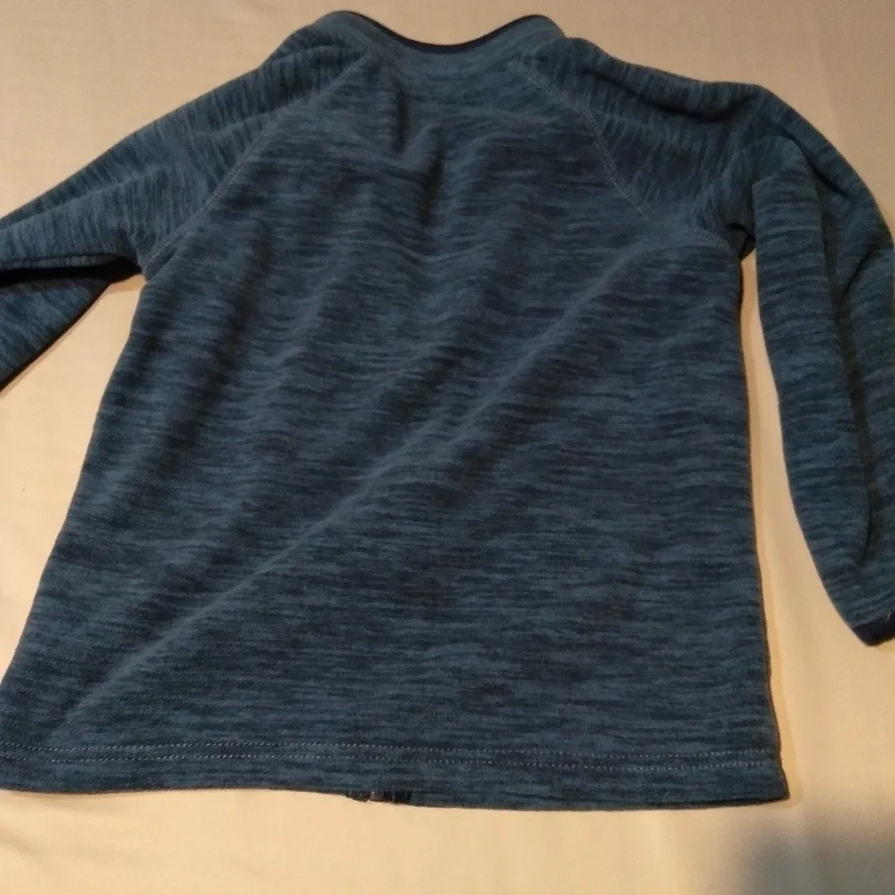 JUMPING bean brand Girls zip up thumb hole jacket. Blue print. Size Medi…